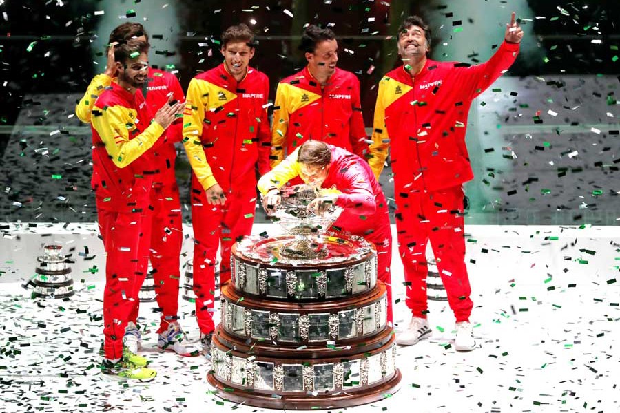 Spain's Rafael Nadal celebrating with the trophy and teammates after winning the Davis Cup final against Canada at the Davis Cup Madrid Finals 2019 in Madrid on Sunday	— Reuters