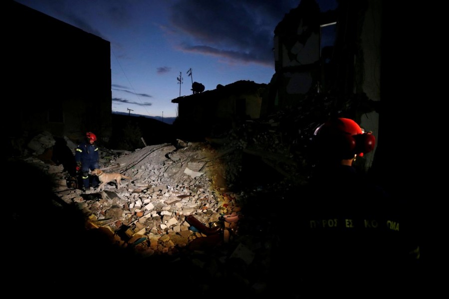 Emergency personnel from Greece work at a damaged building, following Tuesday's powerful earthquake, in Thumane, Albania, November 27, 2019. REUTERS/Florion Goga