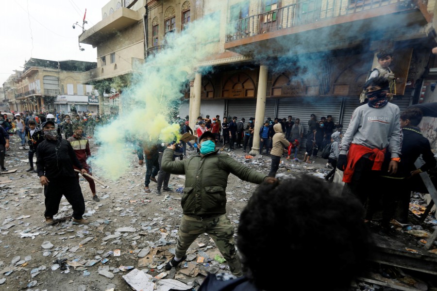 Iraqi demonstrators take part during the ongoing anti-government protests in Baghdad, Iraq, on Thursday — Reuters photo