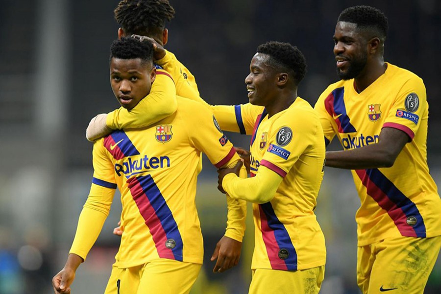 Barcelona's Anssumane Fati (first from left) celebrates scoring their second goal with teammates — Reuters photo