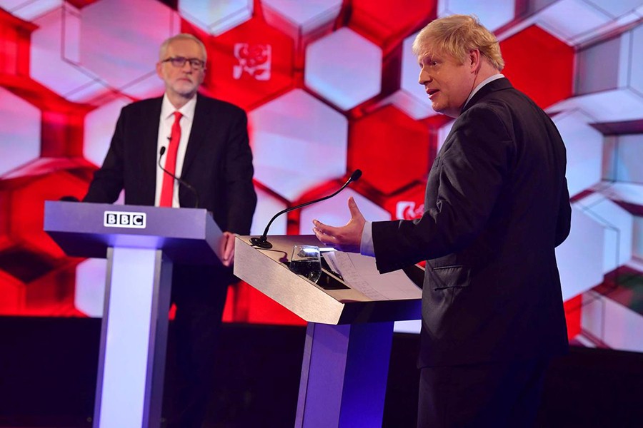 Britain's Prime Minister Boris Johnson and opposition Labour Party leader Jeremy Corbyn face each other in a head-to-head debate on the BBC in London, Britain on December 6, 2019 — Reuters photo