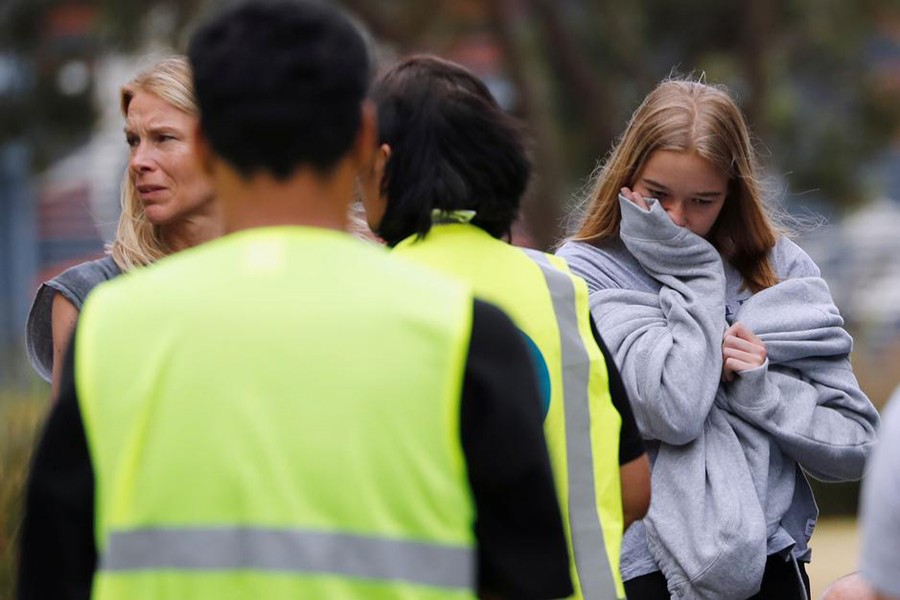 Relatives of the volcano eruption victims react after attending a ceremony called "Karakia" with Ngati Awa representatives, at Mataatua Marae house in Whakatane, New Zealand on December 12, 2019 — Reuters photo