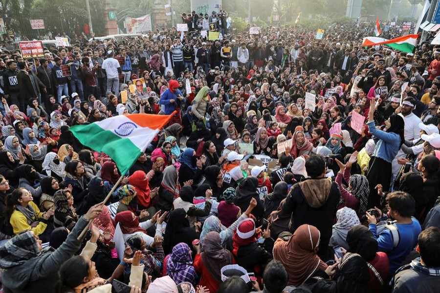 Demonstrators attend a protest against a new citizenship law, outside the Jamia Millia Islamia University in New Delhi, India on December 21, 2019 — Reuters photo