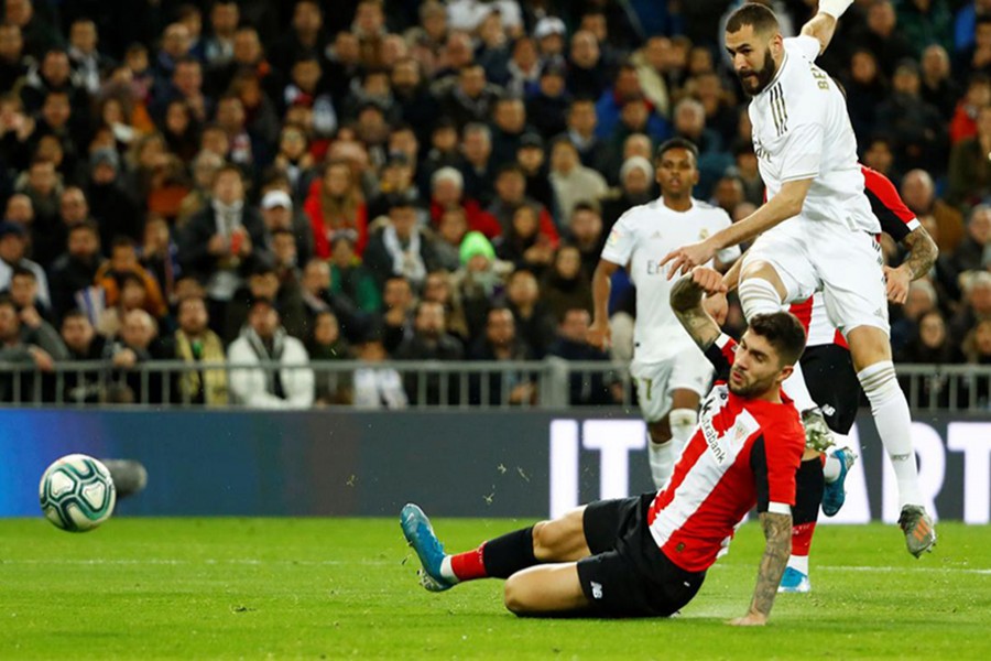 Real Madrid's Karim Benzema shoots at goal during the clash against Athletic Bilbao on Sunday — Reuters photo