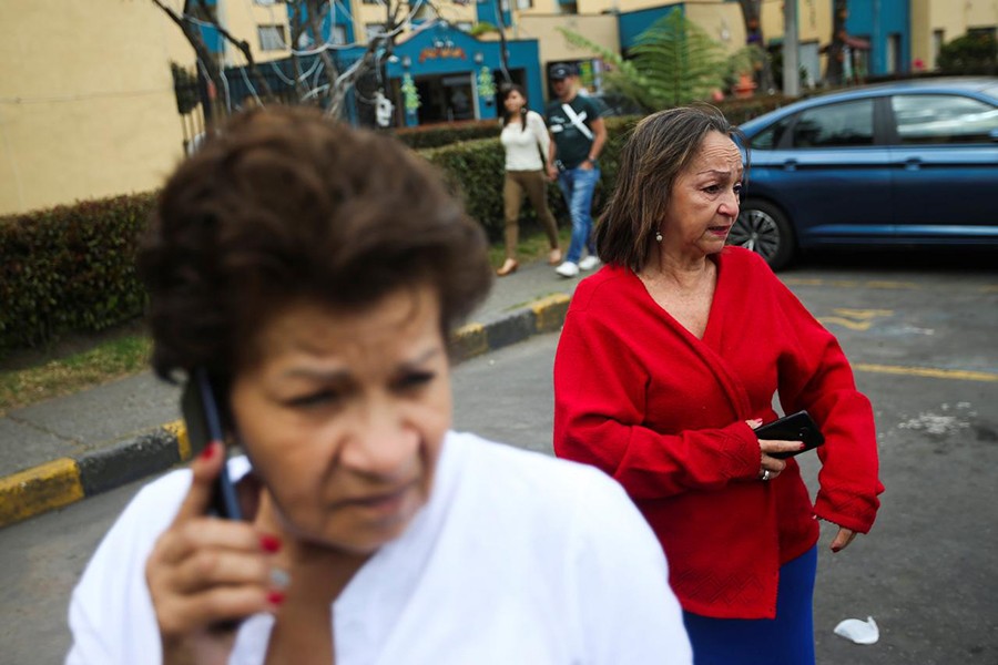 People anxiously react after an earthquake in Bogota, Colombia on December 24, 2019 — Reuters photo