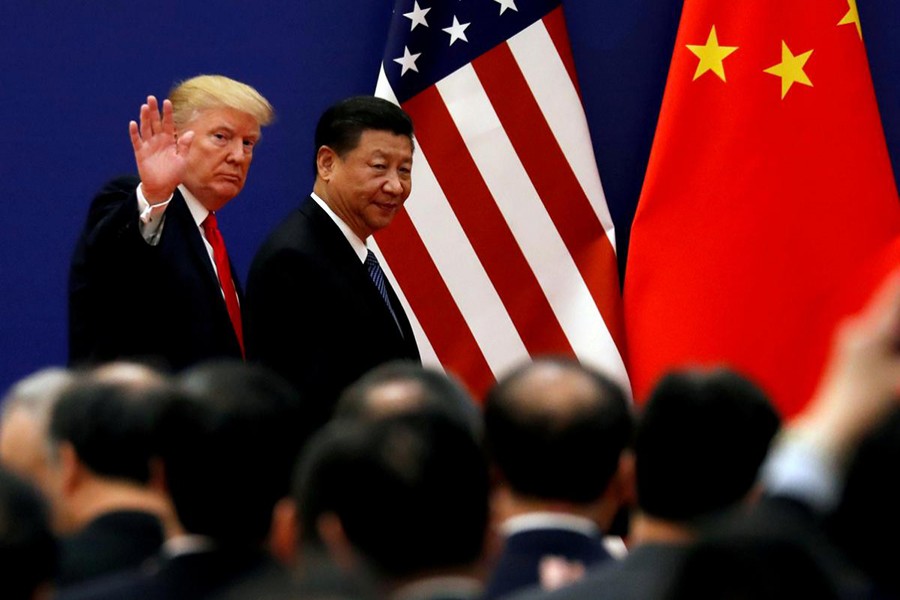 US President Donald Trump and China's President Xi Jinping meet business leaders at the Great Hall of the People in Beijing, China on November 9, 2017 — Reuters/Files