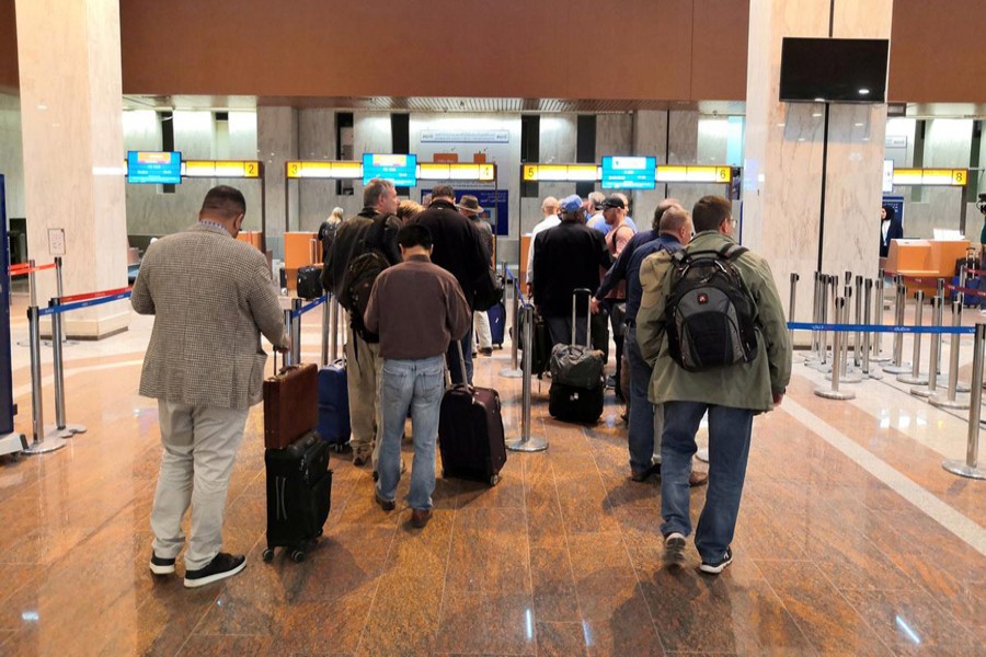 Foreign employees of oil companies are seen leaving Iraq at the airport of Basra, Iraq January 3, 2020. Reuters/Stringer