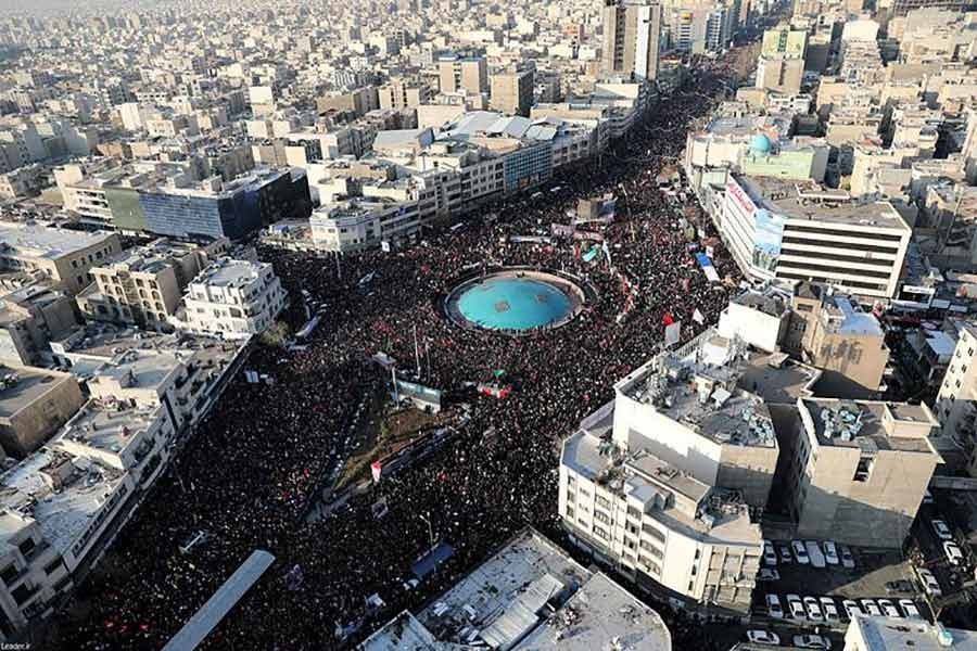 People attend a funeral procession for Iranian Major-General Qassem Soleimani, head of the elite Quds Force, and Iraqi militia commander Abu Mahdi al-Muhandis, who were killed in an air strike at Baghdad airport, in Tehran, Iran on Monday. -Reuters Photo