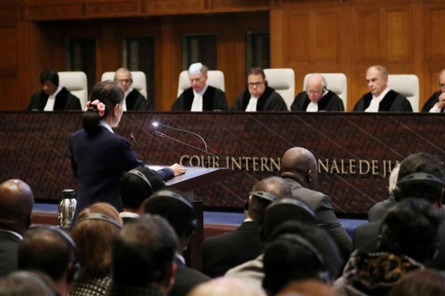 Myanmar's leader Aung San Suu Kyi speaks in front of the judges on the second day of hearings in a case filed by Gambia against Myanmar alleging genocide against the minority Muslim Rohingya population, at the International Court of Justice (ICJ) in The Hague, Netherlands on December 11, 2019 — Reuters/Files