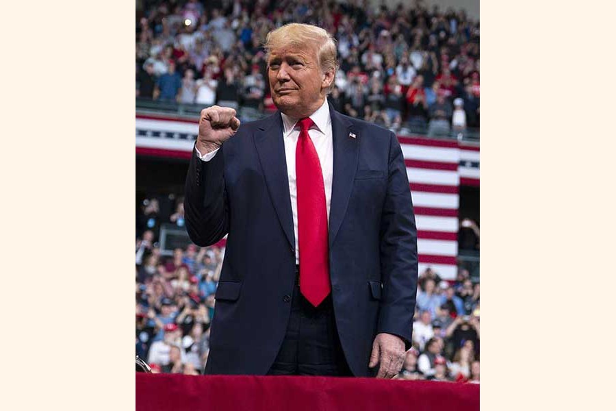 President Donald Trump at a campaign rally in Manchester,  New Hampshire.          —AP Photo   