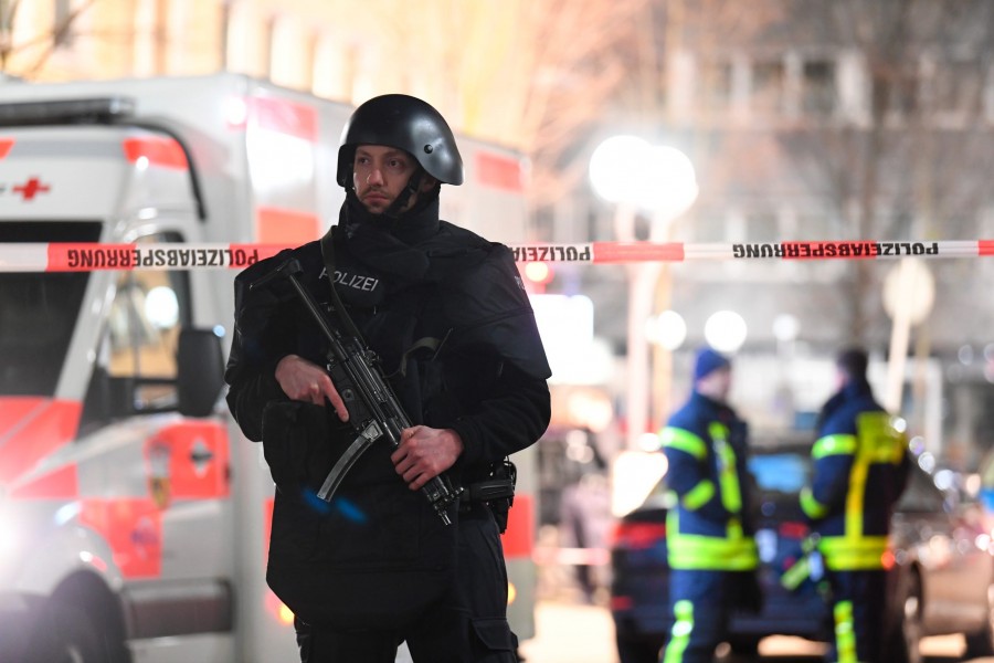 Police officers secure an area after a shooting in Hanau near Frankfurt, Germany, February 20, 2020. Reuters