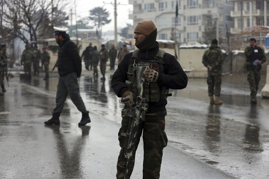 Afghanistan security forces standing guard at the site of suicide attack near the military academy in Kabul, Afghanistan on February 11. -AP file photo