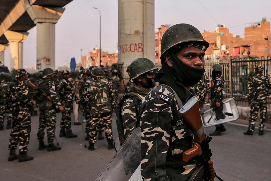 Paramilitary troops patrol in a riot affected area after clashes erupted between people demonstrating for and against a new citizenship law in New Delhi, India on February 25, 2020 — Reuters photo