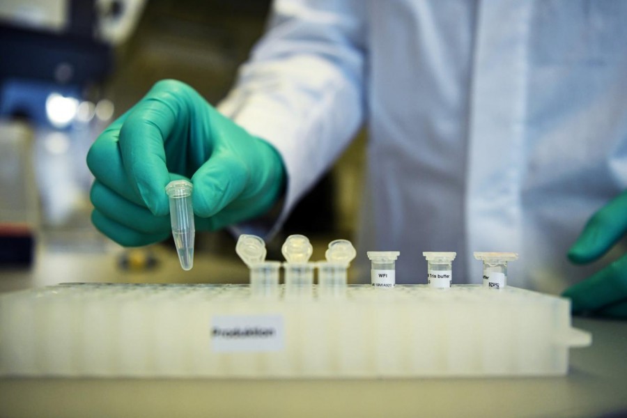 Employee Philipp Hoffmann, of German biopharmaceutical company CureVac, demonstrates research workflow on a vaccine for the coronavirus (COVID-19) disease at a laboratory in Tuebingen, Germany, March 12, 2020. — Reuters