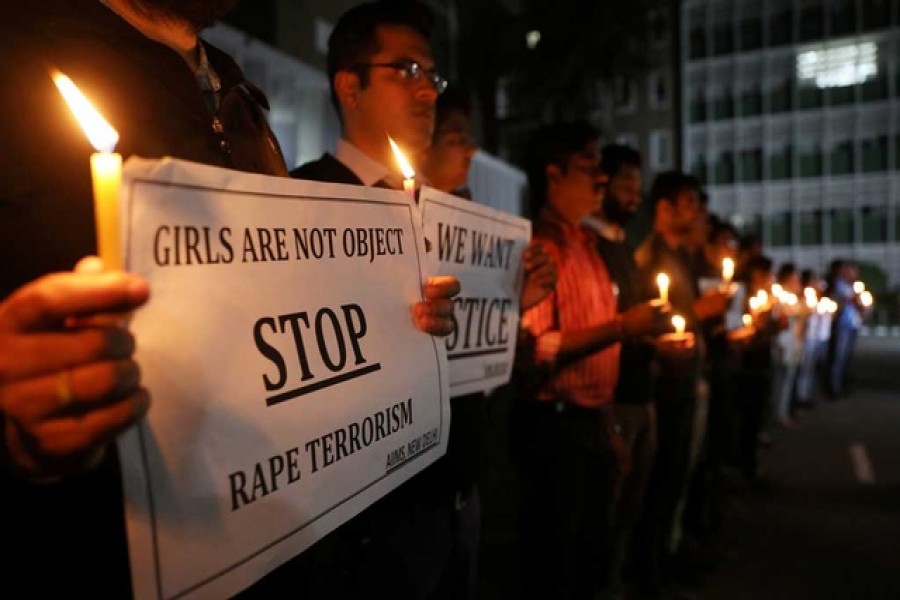 Resident doctors and medical students from All India Institute Of Medical Sciences (AIIMS) attend a candle-lit march to protest against the alleged rape and murder of a 27-year-old woman on the outskirts of Hyderabad, in New Delhi, India, December 03, 2019. — Reuters/Files