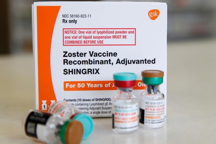 FILE PHOTO: A box and vials of the drug Shingrix, made by GlaxoSmithKline Pharmaceutical, sit on a counter at a pharmacy in Provo, Utah, US January 9, 2020. Reuters