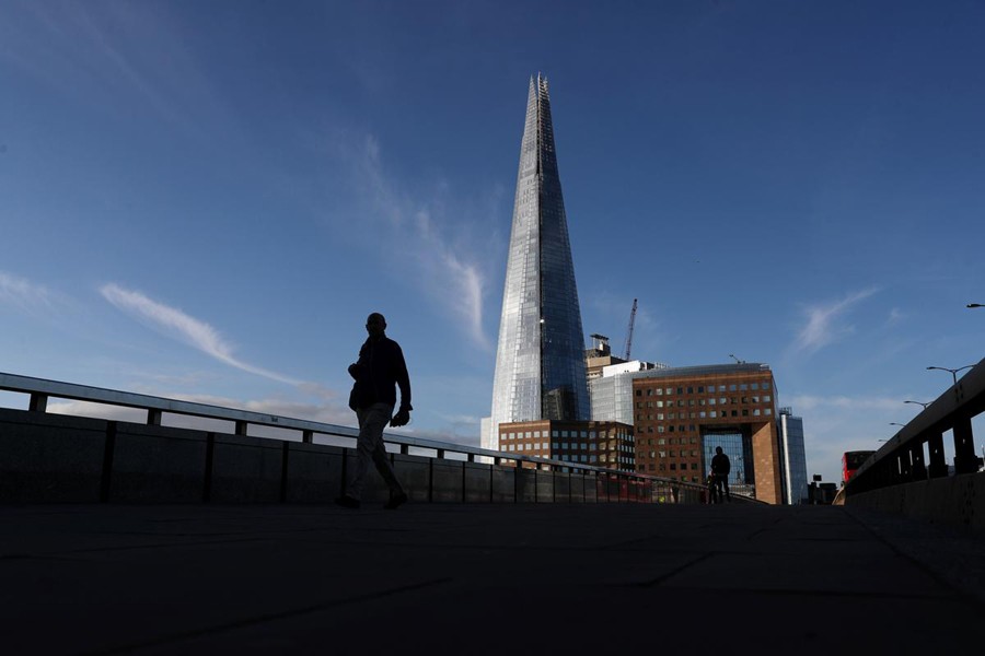 People walk along London Bridge following the outbreak of the coronavirus disease (COVID-19), in London, Britain on May 11, 2020 — Reuters photo