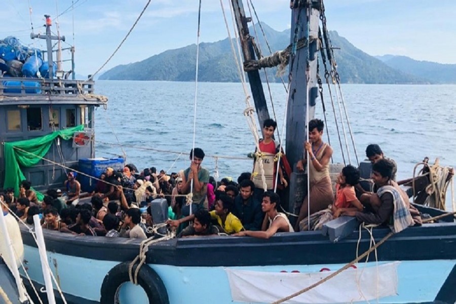 A boat carrying suspected ethnic Rohingya migrants is seen detained in Malaysian territorial waters, in Langkawi, Malaysia April 05, 2020. Malaysian Maritime Enforcement Agency/Handout via Reuters