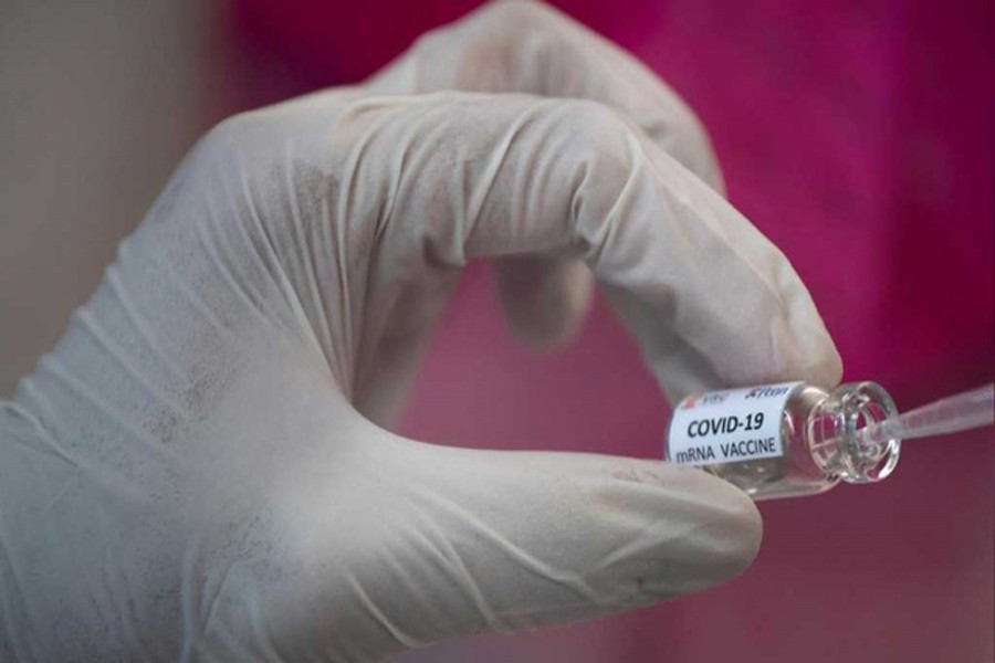 A researcher works inside a laboratory of Chulalongkorn University during the development of an mRNA type vaccine candidate for the coronavirus disease (COVID-19) in Bangkok, Thailand, May 25, 2020. REUTERS