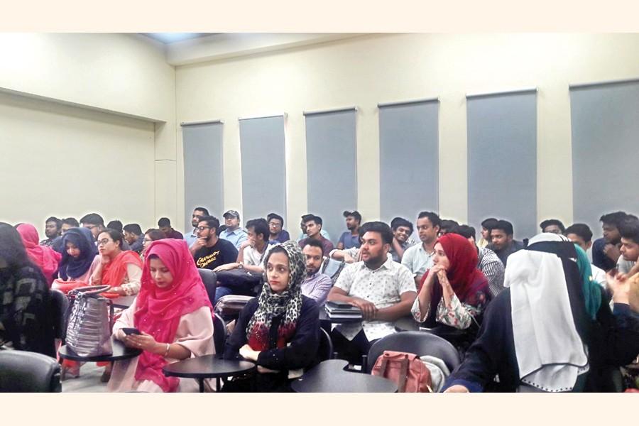 Interested candidates crowd at an ACCA admission information session