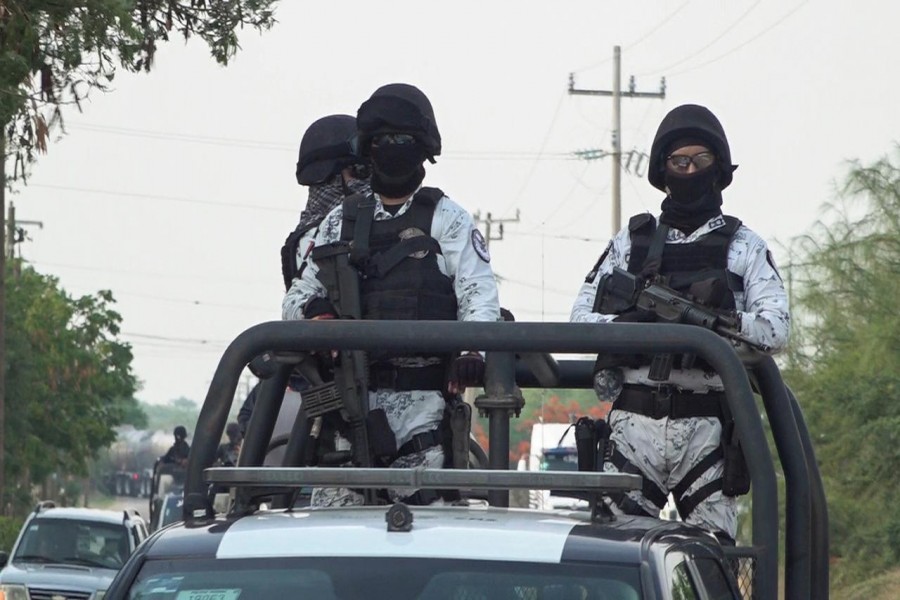 Members of the Mexico's National Guard patrol a road after assailants killed 15 inhabitants of an indigenous village, that has been plagued by local disputes, in San Mateo del Mar, in Oaxaca state, Mexico June 22, 2020. REUTERS/Jose de Jesus Cortes