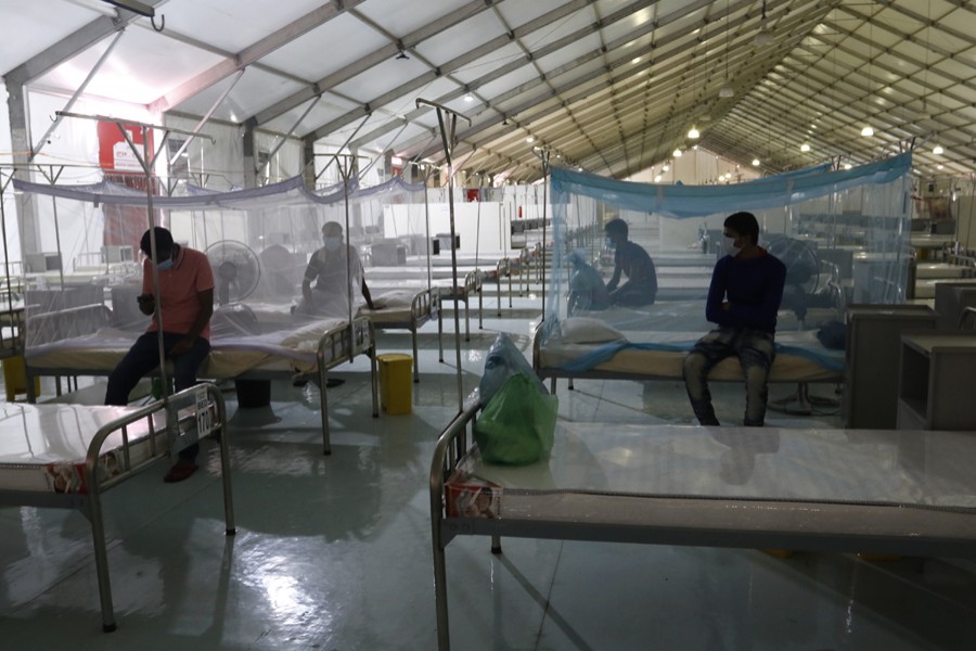 Patients diagnosed with the coronavirus disease (Covid-19) are seen inside a recently constructed makeshift hospital at the International Convention City Bashundhara (ICCB) in Dhaka