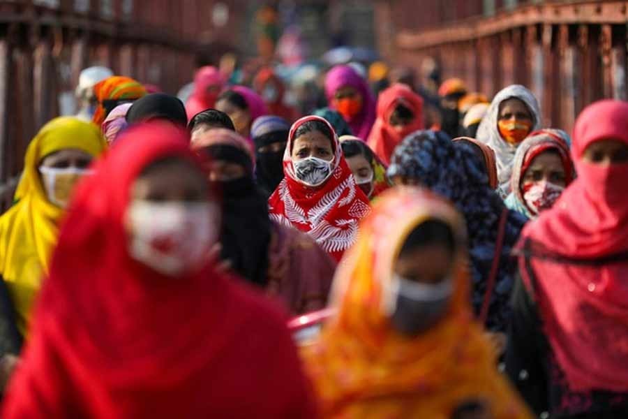 Garment workers return from a workplace as factories reopened after the government has eased the restrictions amid concerns over the coronavirus disease (COVID-19) outbreak in Dhaka, Bangladesh, May 04, 2020 — Reuters/Files