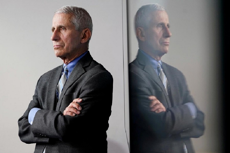 National Institute of Allergy and Infectious Diseases Director Dr Anthony Fauci is reflected in a video monitor behind him on stage as he listens to the daily coronavirus task force briefing at the White House in Washington, US, April 08, 2020 — Reuters/Files