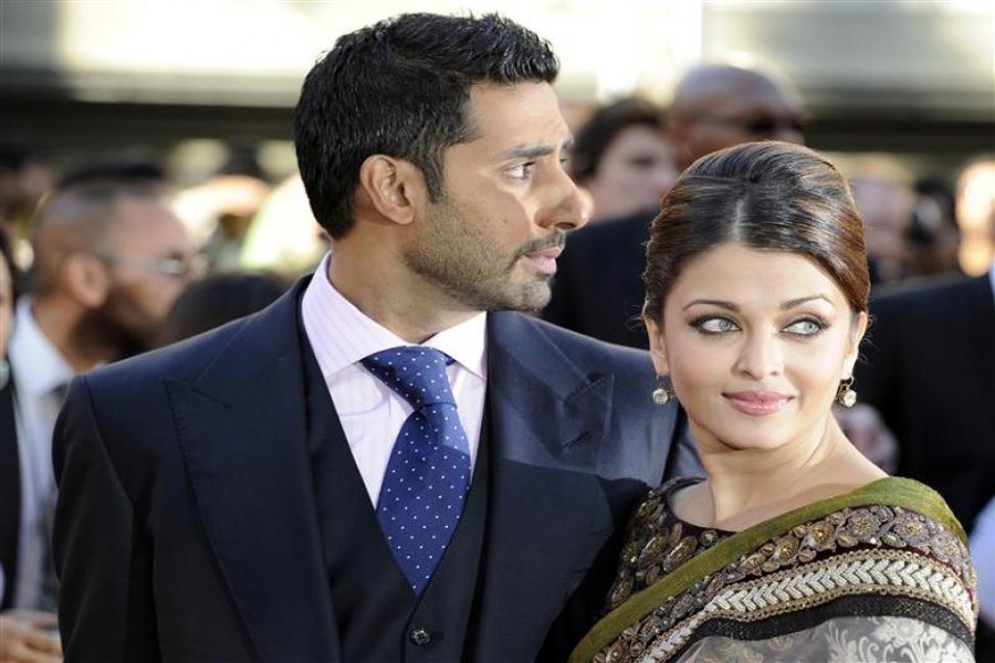 Bollywood couple Abhishek Bachchan (L) and Aishwarya Rai Bachchan arrive for the world premiere of their film 'Raavan' at the BFI in London, June 16, 2010. REUTERS/Paul Hackett