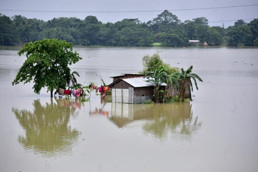 A partially submerged house is seen at the flood-affected Mayong village in Morigaon district, in Assam, June 29, 2020. REUTERS