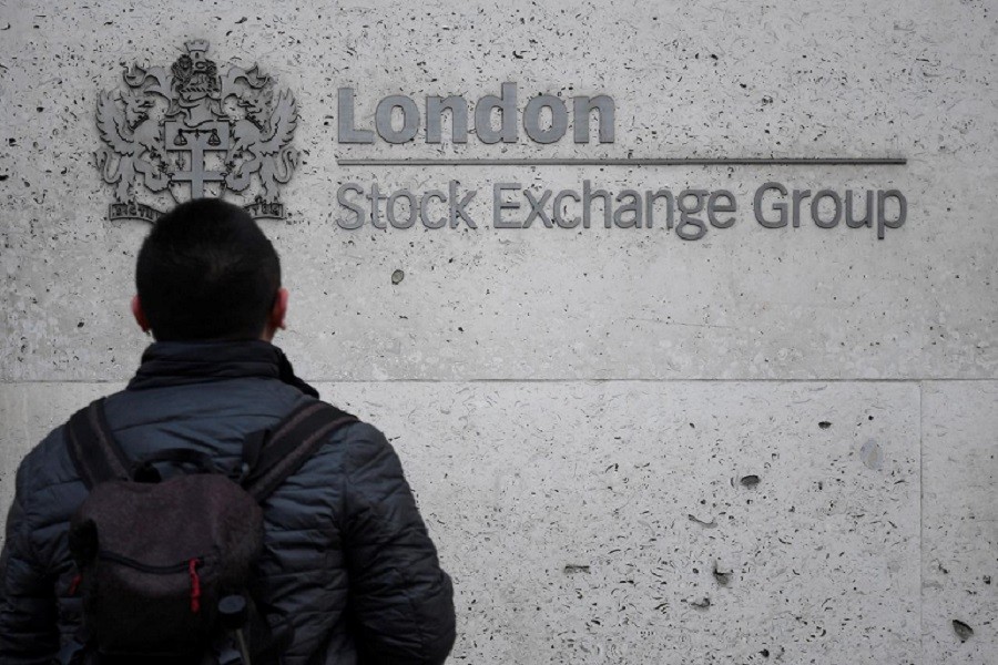 People walk past the London Stock Exchange Group offices in the City of London, Britain, December 29, 2017 — Reuters/Files