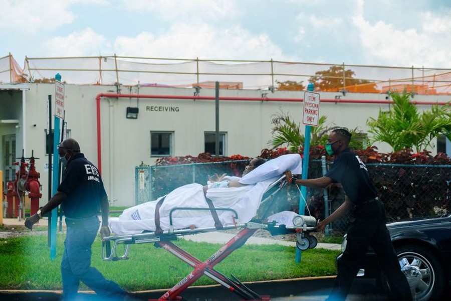 Emergency Medical Technicians (EMT) leave with a patient at North Shore Medical Centre where the coronavirus disease (Covid-19) patients are treated, in Miami, Florida, US on July 14 — Reuters/Files