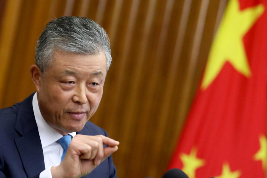 FILE PHOTO: Chinese Ambassador to Britain Liu Xiaoming gestures during a news conference in London, Britain, Aug. 15 2019. REUTERS/Simon Dawson/File Photo