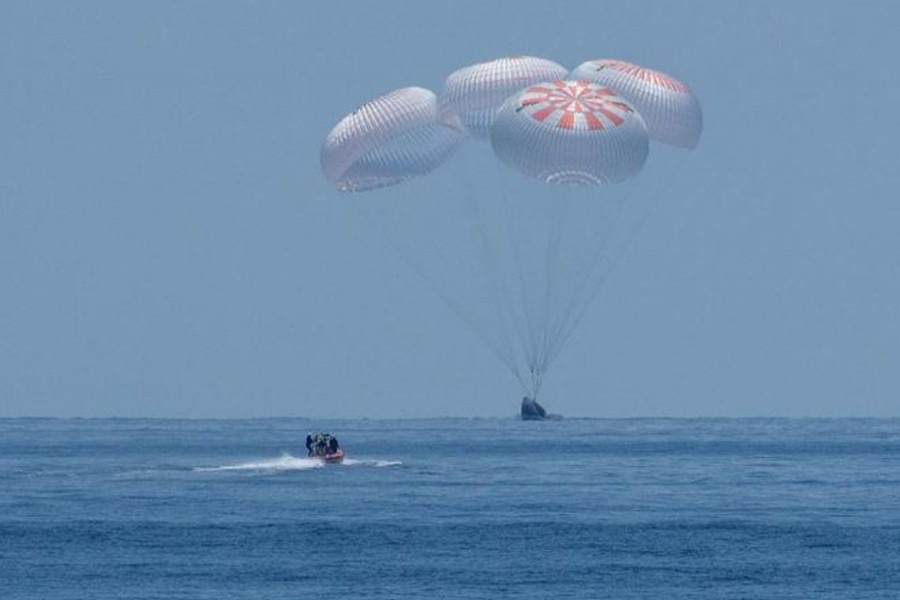 NASA astronauts make historic return to Earth