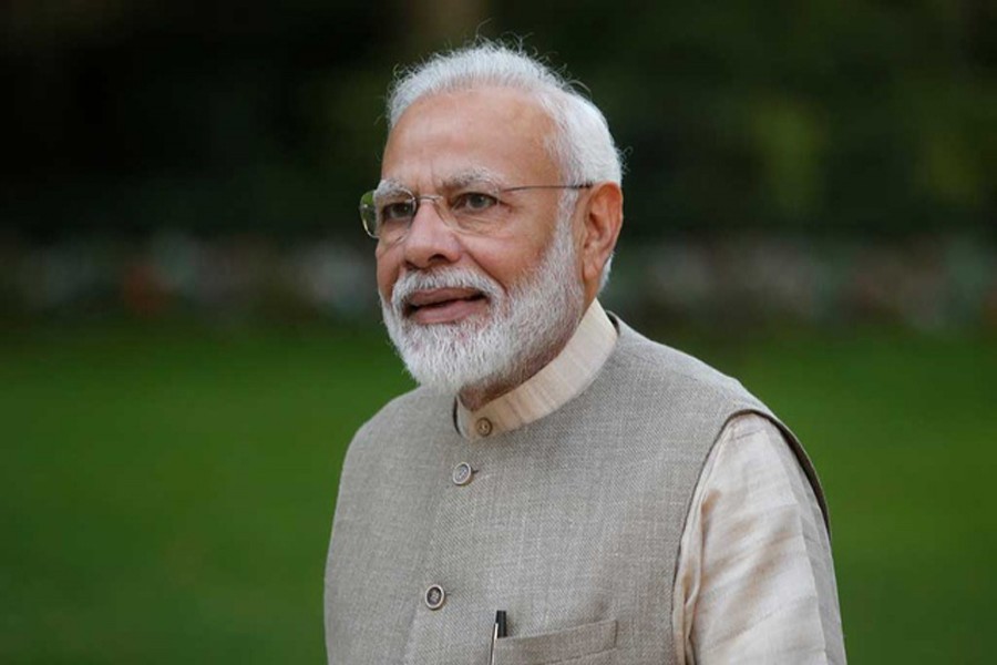 Indian Prime Minister Narendra Modi walks in the garden of the French Prime Minister's residence before their talks in Paris, France August 23, 2019. Michel Spingler/Pool via REUTERS