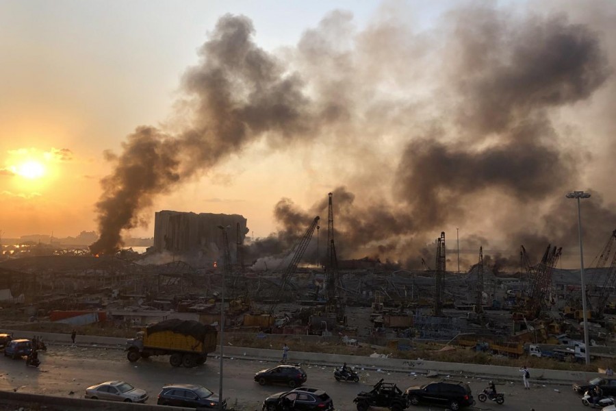 Smoke rises from the site of an explosion in Beirut, Lebanon August 4, 2020. REUTERS/Issam Abdallah