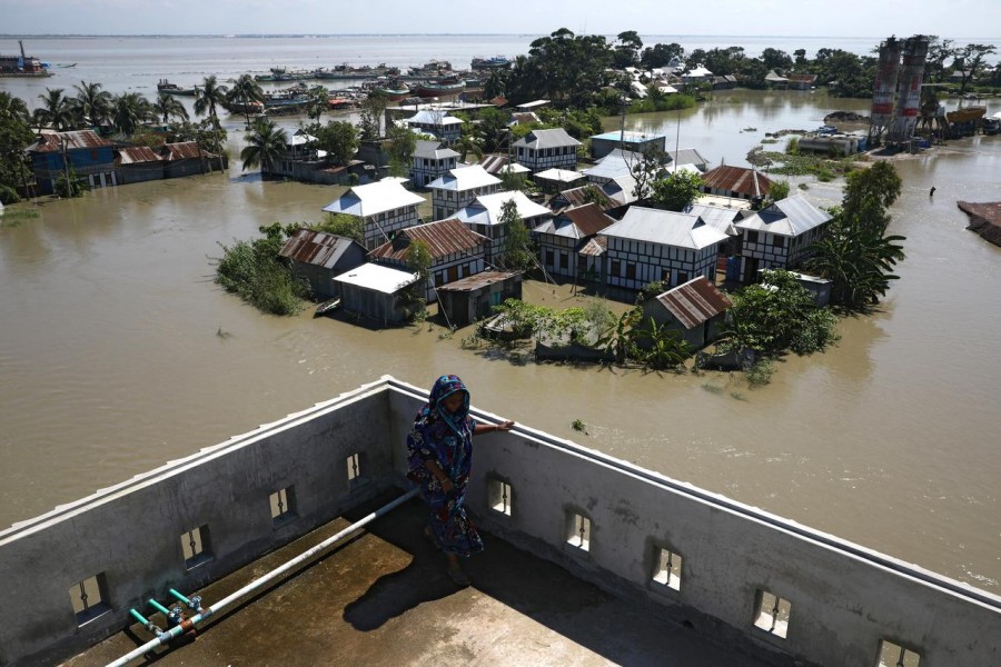 Houses located beside the Padma river are seen flooded as the flood situation worsens in Munshiganj district, on the outskirts of Dhaka, Bangladesh, July 25, 2020 — Reuters/Files