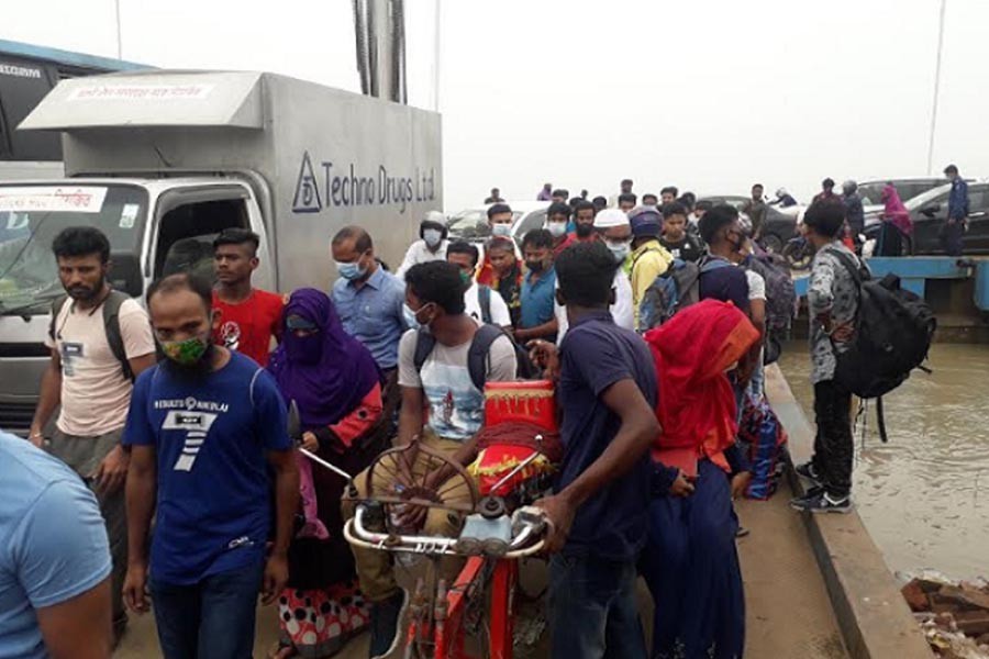 Eid holidaymakers crowded the Paturia-Daulatdia ferry to cross the Padma river. The photograph was taken from the Daulatdia ferry ghat on Sunday — FE Photo