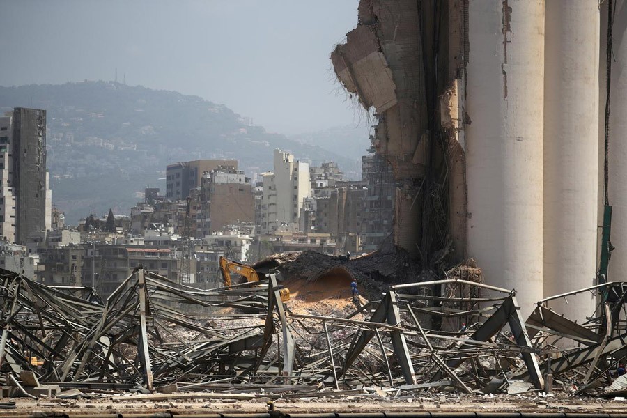 FILE PHOTO: A man is seen at the site of Tuesday's blast in Beirut's port area, Lebanon August 8, 2020. REUTERS/Hannah McKay/File Photo