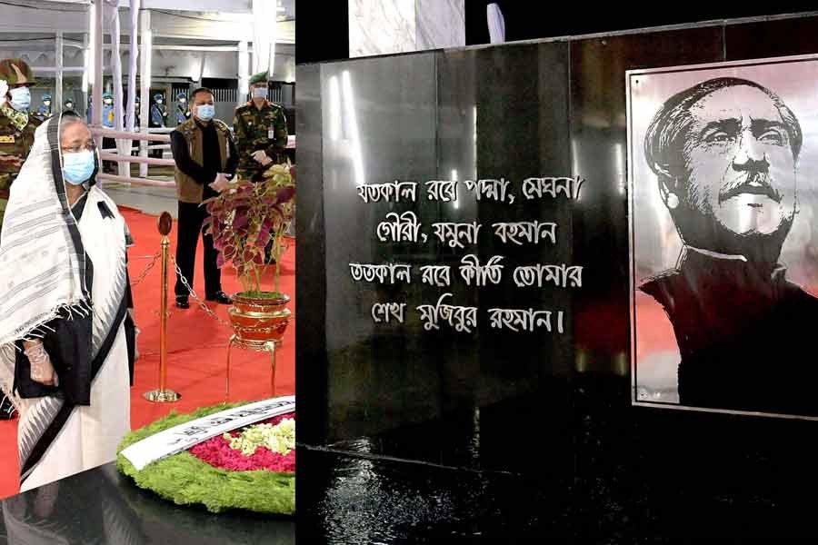 Prime Minister Sheikh Hasina  standing in solemn silence after placing a wreath at the portrait of Father of the Nation Bangabandhu Sheikh Mujibur Rahman at the Bangabandhu Memorial Museum at Dhanmondi Road No. 32 in the capital on Staruday marking the National Mourning Day –PID Photo