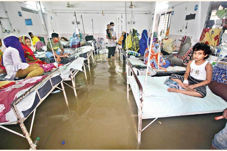 The Mother and Childcare Hospital at Agrabad in Chattogram went under water due to rain and high tide on Monday, causing sufferings to the patients — Focus Bangla