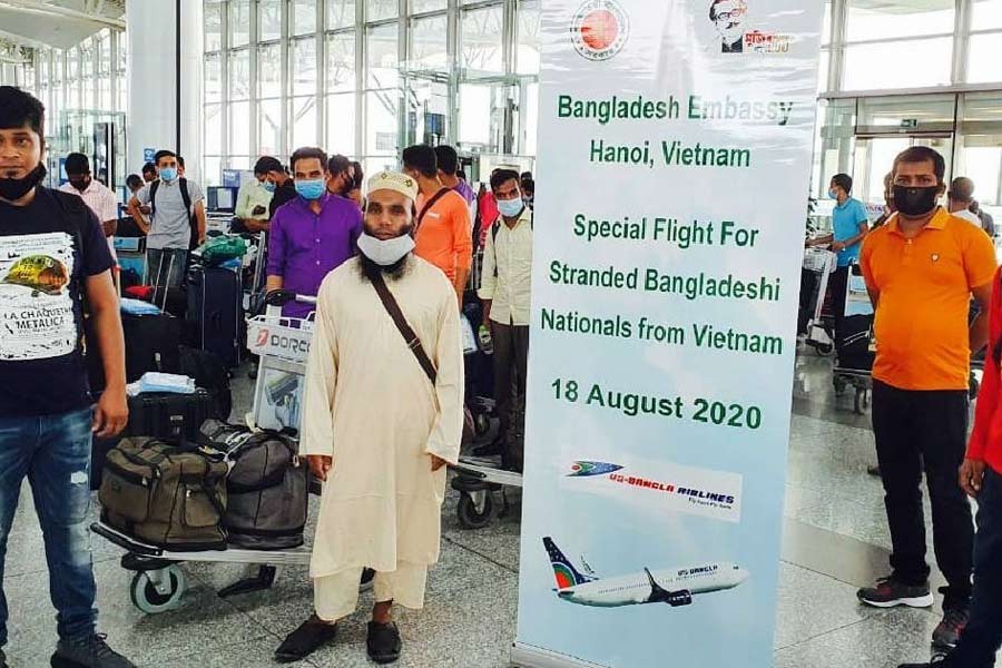 113 stranded Bangladeshis return from Vietnam