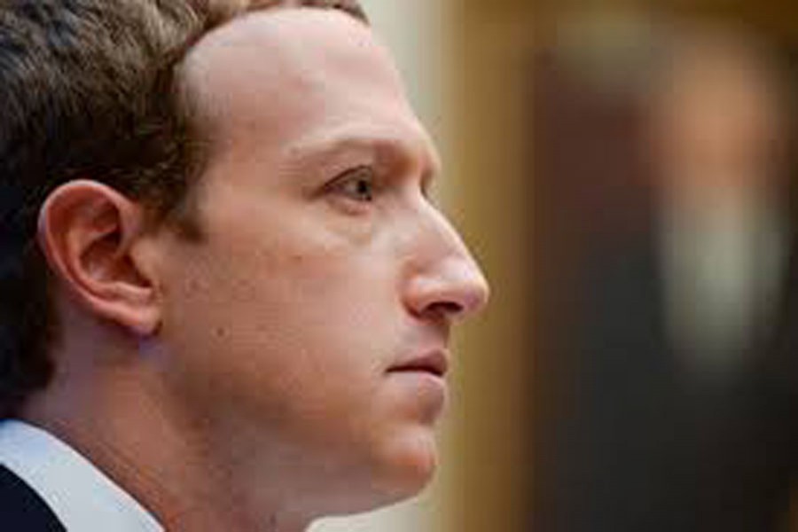 FILE PHOTO: Facebook Chairman and CEO Mark Zuckerberg testifies at a House Financial Services Committee hearing in Washington, U.S., October 23, 2019. REUTERS/Erin Scott