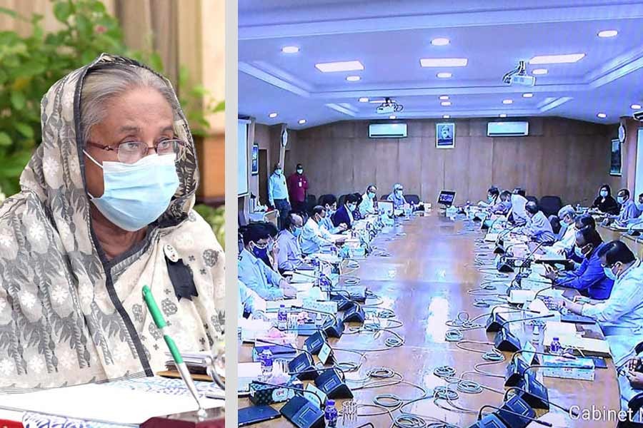 Prime Minister Sheikh Hasina presiding over the cabinet meeting through a videoconference from Ganabhaban while other cabinet members joined it from the secretariat on Monday –PID Photo