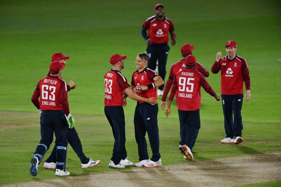 First T20 International - England v Australia - Ageas Bowl, Southampton, Britain - September 4, 2020 England's Tom Curran and teammates celebrate victory - Dan Mullan/Pool via REUTERS