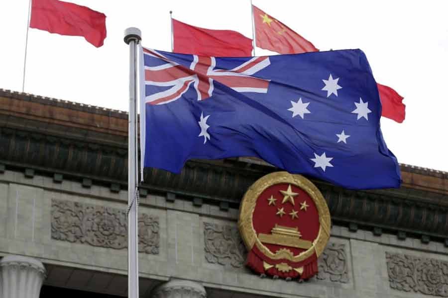 Australia flies journalists out of China after questioning