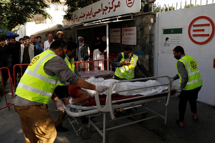 Afghan men carry an injured to a hospital after a blast in Kabul, Afghanistan on September 9, 2020 — Reuters photo