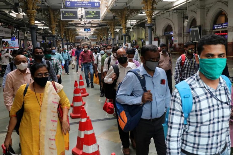 People wearing protective face masks leave the Chhatrapati Shivaji Terminus railway station, amidst the coronavirus disease (COVID-19) outbreak, in Mumbai, India on September 22, 2020 — Reuters photo