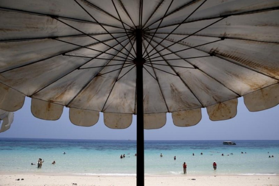 Tourists are seen on a beach of Maiton Island in Phuket, Thailand — Reuters/Files