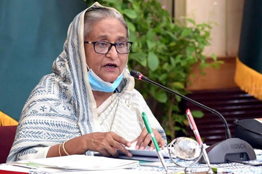 Prime Minister Sheikh Hasina joins the weekly ECNEC meeting virtually from her official residence Ganabhaban. Photo source: BSS